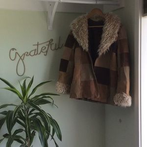 Brown fuzzy lined leather coat
